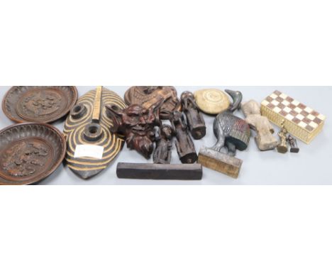Various carvings including a bone miniature chess box, a mask, dishes etc.