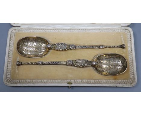 A cased pair of silver gilt replica coronation spoons, by R &amp; S. Garrard, London 1910, 4.3oz.