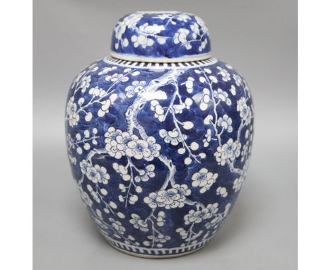 A large Chinese blue and white jar and cover, Kangxi mark, late 19th century, height 30cm