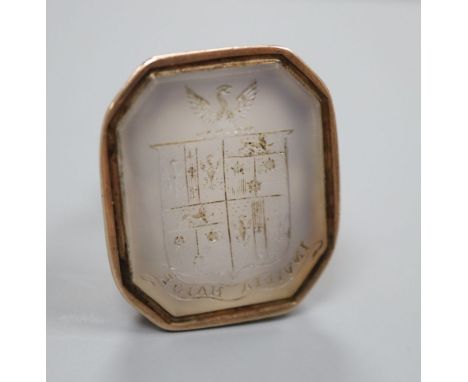 A late Georgian yellow metal agate intaglio seal, 2.9cm