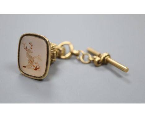 A Regency gold seal with chalcedony intaglio of a heart with an anchor, with short 18ct gold chain a 'T' bar, 22 grams (gross