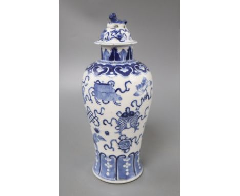 A Chinese blue and white Buddhist Emblem's vase and cover, Kangxi mark but c. 1900, overall height 26.5cm