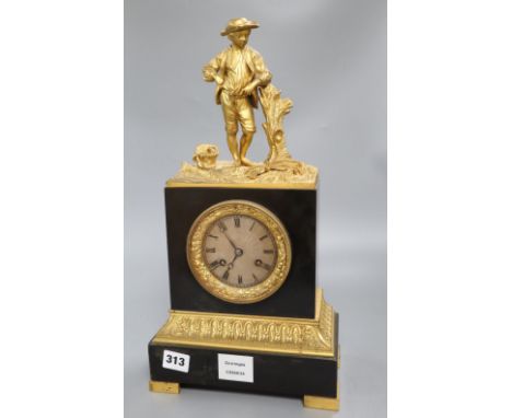 A 19th century French ormolu mounted black marble eight day mantel clock, surmounted by a figure of a youthCONDITION: The mov