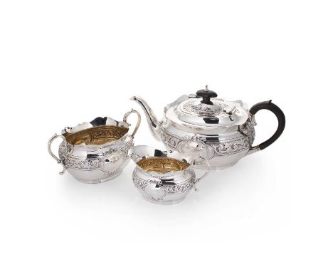 An Edward VII silver three-piece tea set, mark of Charles Westwood &amp; Son, Birmingham 1905, the teapot of oval form with c