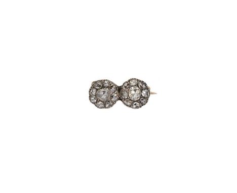 A double diamond cluster brooch, two foil backed rose cut diamond clusters, diameter approximately 10.5mm, estimated approxim