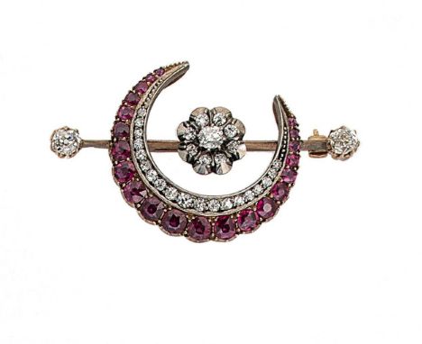 A ruby and diamond crescent brooch, floral diamond cluster, with a central old mine cut diamond, approximately 4 x 3.8mm, sur