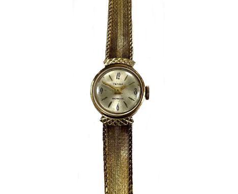 Tenax - A Swiss 14ct gold wristwatch, circa 1960, the signed circular silvered dial, 12mm diameter, with black quatre Arabic 