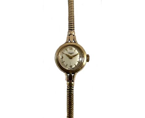 Longines - A 9ct gold wristwatch, circa 1960, the signed circular cream-coloured dial, 13mm diameter, with gold coloured quat
