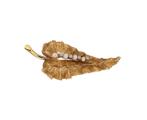 A pearl and diamond leaf pendant, textured leaf with a central row of pearl and eight cut diamonds, dimensions 5.7 x 2.5cm, p