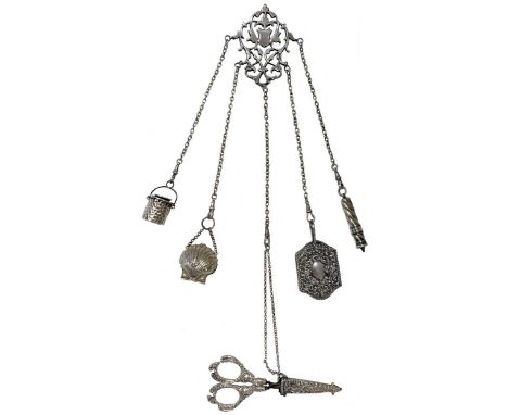 An early 20th century silver 5 chain chatelaine with attachments,  mark of John Tiley, London 1902, comprising a cast and pie