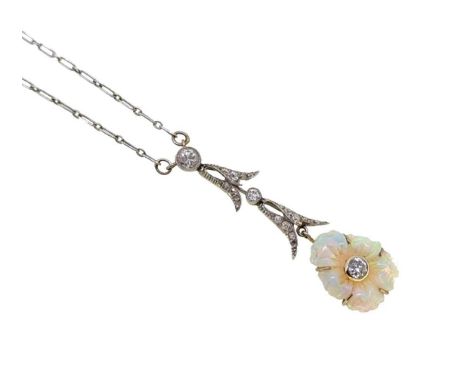 An early 20th century carved opal and diamond necklace, carved opal flower with a central rubover set old European cut diamon