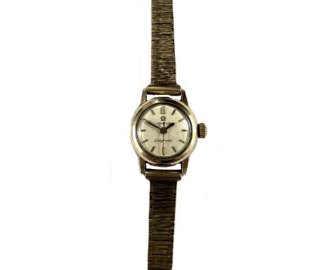 Omega - A gold-plated 'Ladymatic' wristwatch on a later 9ct gold bracelet, circa 1956, model number 3118, the signed cream-co