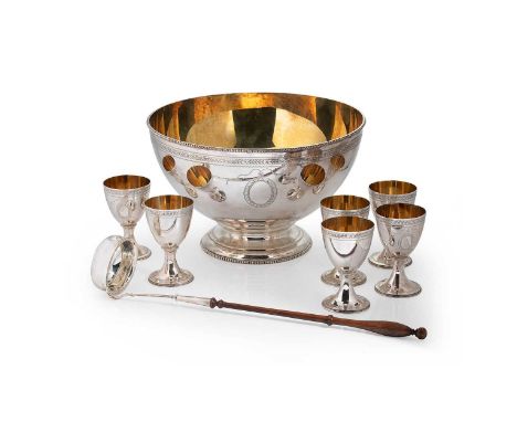 An Elizabeth II silver punchbowl with 6 goblets and ladle, mark of C.J. Vander, London 1973, the bowl of circular form with b