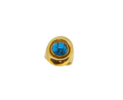 A modern turquoise dress ring, oval shaped head set with a round cabochon turquoise, diameter approximately 10.5mm, head dime