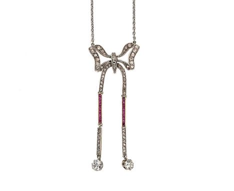 A ruby and diamond negligee style bow necklace, the bow grain set with graduated rose cut diamonds and calibré cut rubies, ar