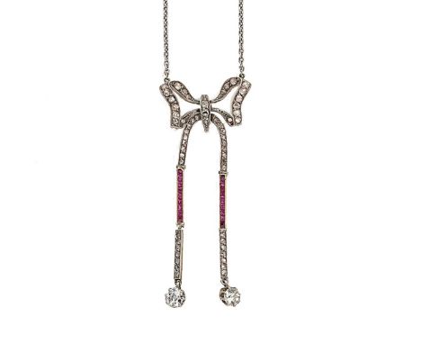 A ruby and diamond negligee style bow necklace, the bow grain set with graduated rose cut diamonds and calibré cut rubies, ar