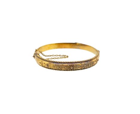 A Victorian 15ct gold bangle, filigree front section with rope style border, plain back section, inside diameter 5.8cm, width