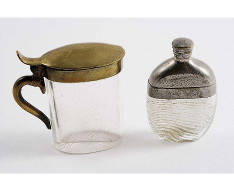 A LATE 19TH CENTURY BRASS-MOUNTED GLASS VESTA CASE in the form of a tankard and a nickel-mounted ribbed glass vesta case in t