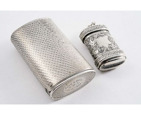 A VICTORIAN SILVER VESTA CASE of oval tubular form with engine-turning and a flip cover, inscribed "From A.McL to D.S 272.190