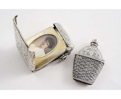 A VICTORIAN SILVER VESTA CASE resembling a flask or bottle with a wicker-clad lower body, by Adie & lovekin Ltd., Birmingham 