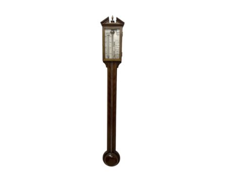 20th century- mercury stick barometer in a mahogany case with inlay, broken pediment with finial and round base, silvered reg