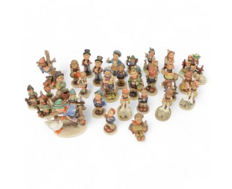 Collection of approximately  thirty four Hummel figures including Barnyard Hero, Strolling Along, Eventide Abendlied, Wayside
