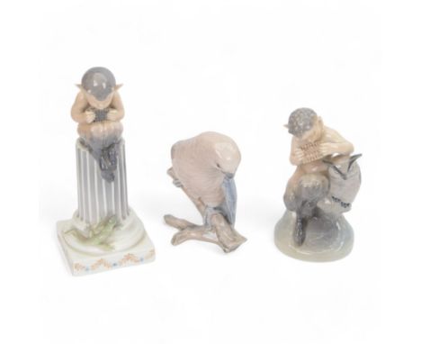 Two Royal Copenhagen figurines of fawns, comprising a fawn with an owl, no 2107 and fawn on plinth no 433, together with Bing