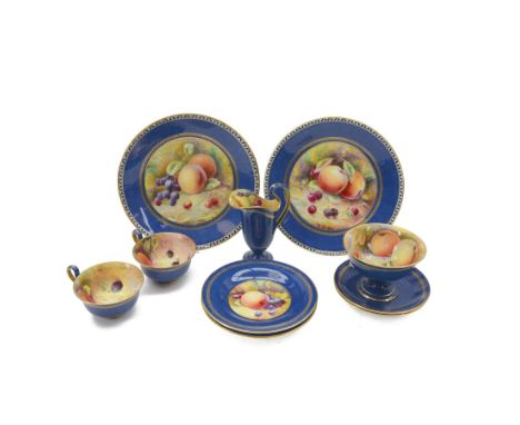 Wedgwood tea set for two, decorated with a still life of fruit by R Holland, within a powder blue and gilt ground, comprising