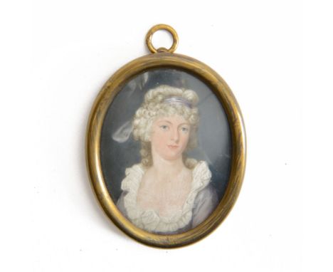 George III portrait miniature upon ivory, head and shoulder portrait of a young woman in light blue gown with white ruffle to