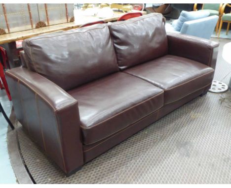 SOFA BED, brown stitched leather. (To be sold in aid of Tribe Freedom Foundation)