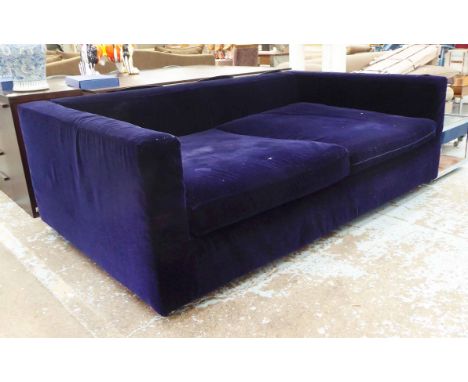 EDRA SOFA, in purple fabric, of deep proportions, on circular supports, 226cm L x 139cm D x 77cm H.