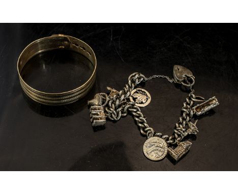A 9ct Front and Back Adjustable Bangle Together with a Silver Charm Bracelet with Eight Charms and Padlock Fastener. 