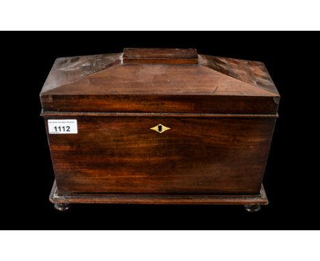 A Victorian Mahogany Tea Caddy fitted interior with two lidded compartments and later glass mixing bowl of sarcophagus shape 