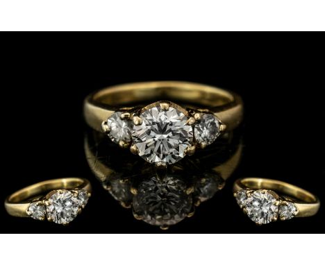 18ct Yellow Gold - Attractive 3 Stone Diamond Set Ring. Marked 18ct to Interior of Shank. The Centre Round Modern Brilliant C