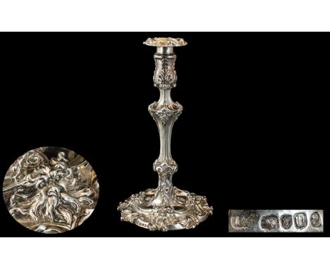 Paul Storr George III Silver Candlestick The sconce cast and chased with overlapping scallop shells on waisted base and pilla