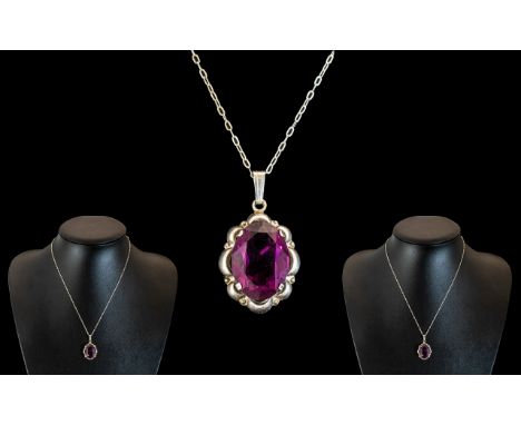 A Sterling Silver Necklace And Amethyst Set Pendant Drop.Excellent Condition. Length 18 inches. 935 High Silver Purity