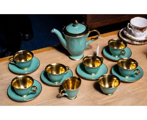 Norwegian Porcelain Tea Set by Stavanger Flint, in jade green with gilt interior, handles and trim, comprising a teapot, milk