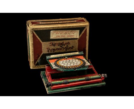 Simplex Tin Plate Toy Typewriter, in original box, made in the USA.  Although a toy, these could print 36 characters on 6 inc