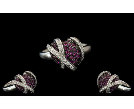 18ct White Gold - Contemporary Designed Ruby and Diamond Set Dress Ring. Marked 18ct to Interior of Shank. The Rubies and Dia