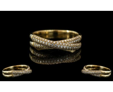 An 18ct Gold Diamond Ring Two Rows of Round Modern Brilliant Cut Diamonds Set on a Twist. Stamped 750, ring size P