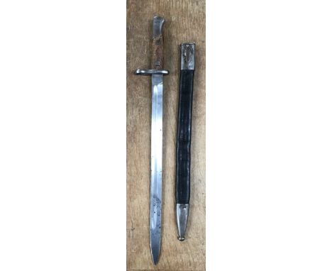 Spanish Mauser Bayonet of the long type for the model 1893 Mauser this one is marked for the National Artillery, with scabbar