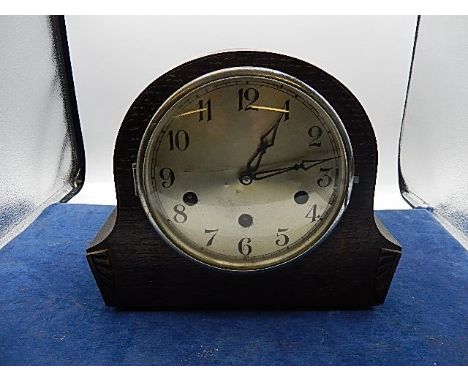 Oak cased mantel clock