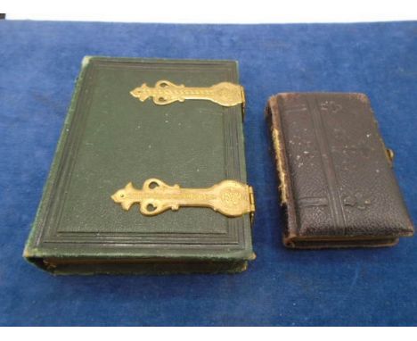2 Victorian cabinet photo albums with family portrait photos (one approx 16 x 12 cm and other 11.5 x 8 cm)