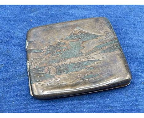 Sterling Silver cigarette case with engraved oriental design, slightly dented