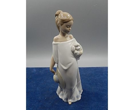 Nao figurine of a girl with her poodle and a bonnet. no cracks or chips