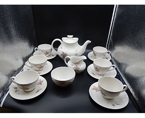 Royal Doulton 'tumbling leaves' part tea service comprising of teapot, 6 cups and saucers, milk and sugar bowl