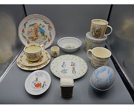 Wedgewood and Bunnykins china items to include Christmas plate with display stand, mug in tin, Bunnykins trio, egg cup and ot