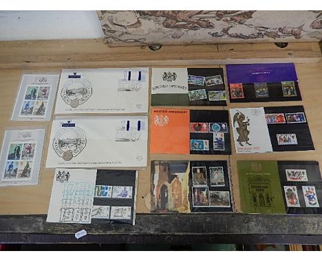 Great lot of 30 presentation packs plus 2 first issue 20p coin first day covers, also includes a miniature sheet.