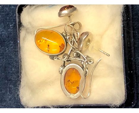 2 Pairs of Amber Earrings largest set in silver mounts