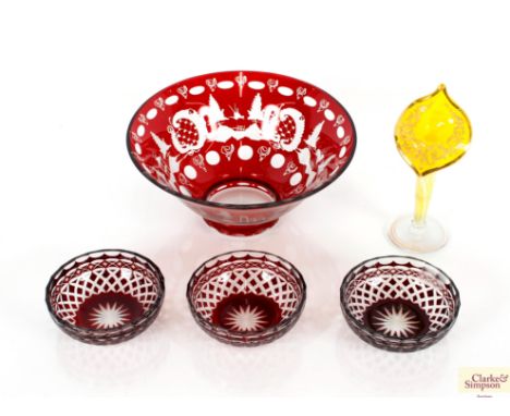 A Bohemian ruby glass bowl; three smaller bowls and a "Jack In The Pulpit" vase